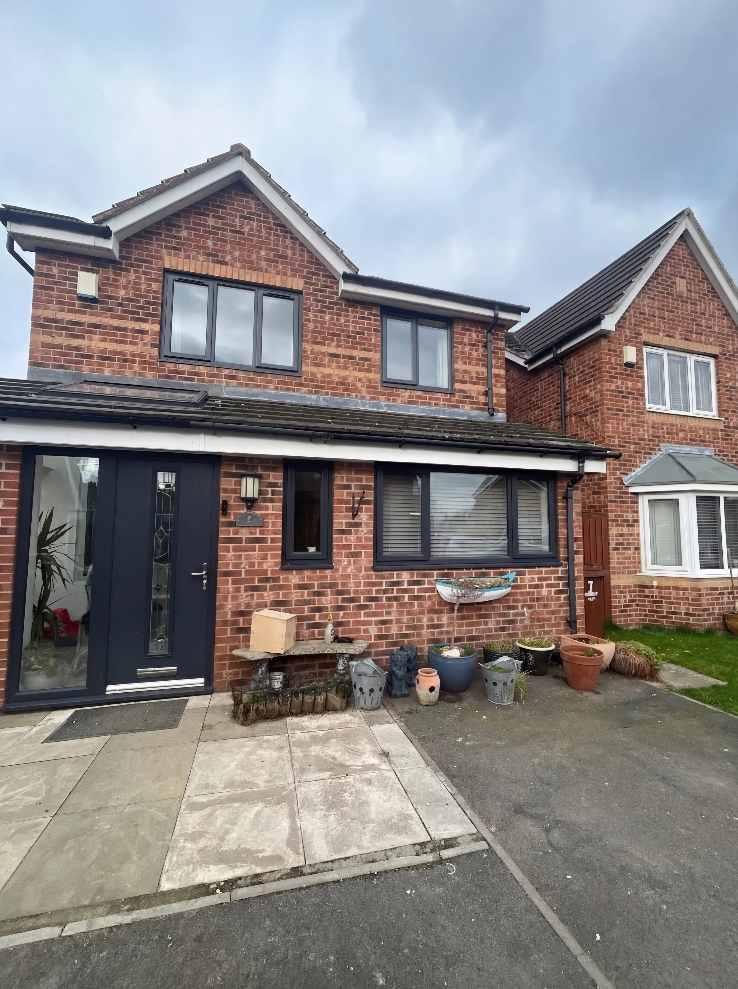 Full house transformation with anthracite grey windows and composite door — real Stylo Glazing installation