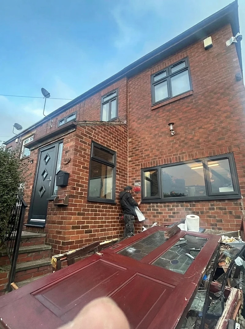 Full house window and door replacement in progress — anthracite grey frames, Bradford